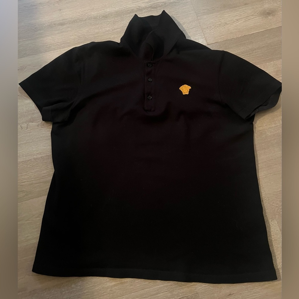 Versace black polo shirt with gold Medusa
